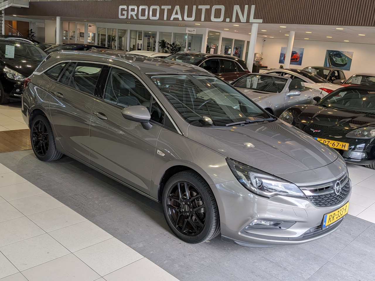 Opel Astra Sports Tourer - 1.4 Innovation Automaat Airco, Cruise Control, Stuurbekrachtiging - AutoWereld.nl