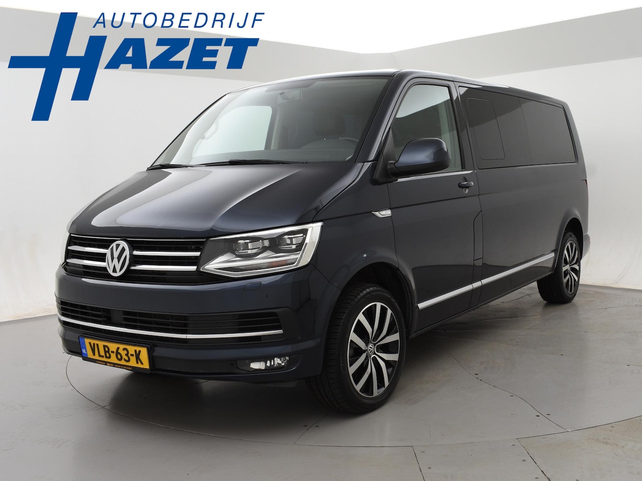 Volkswagen Transporter Caravelle - 2.0 TDI 204 PK DSG DUBBEL CABINE + CAMERA | CARPLAY | LEDER | 18 INCH | LED | STOELVERWARM - AutoWereld.nl