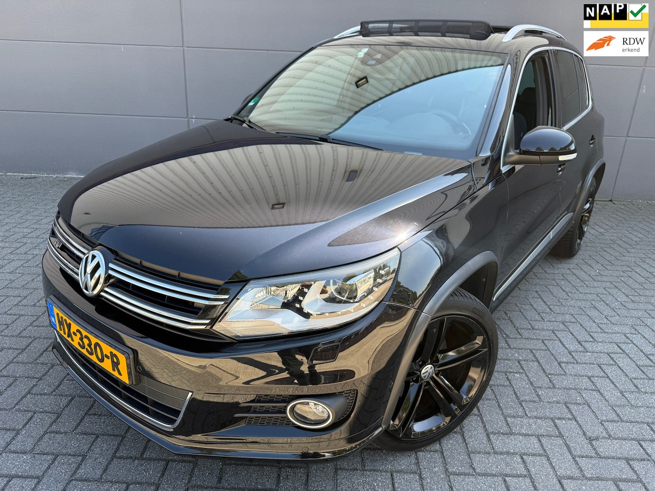 Volkswagen Tiguan - 1.4 TSI R-Line Edition*CRUISE*NAVI*PARK SENSOREN*OPENDAK*VELGEN*NEW APK - AutoWereld.nl