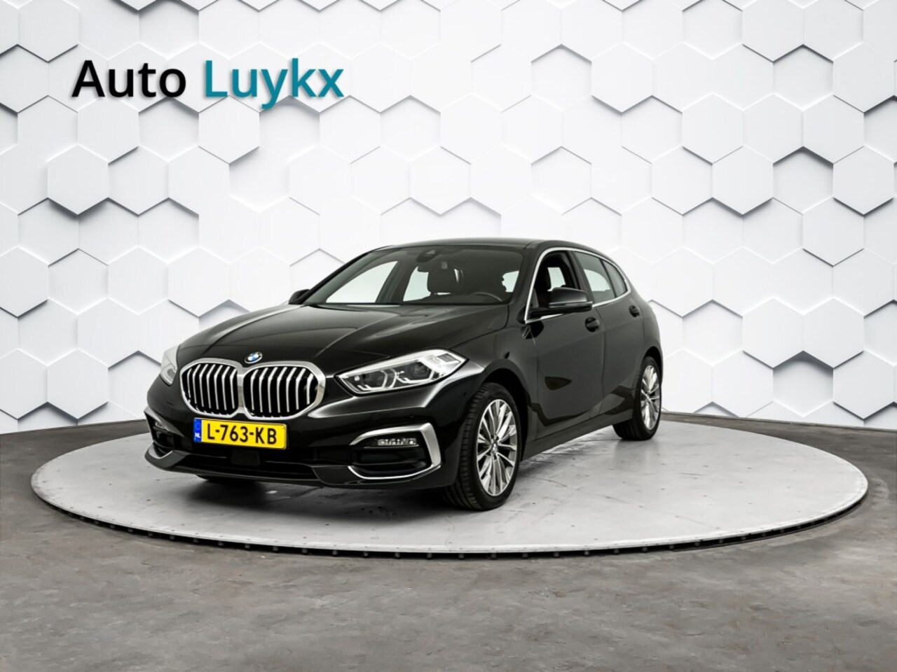 BMW 1-serie - 118i Business Edition+ Automaat | Lederen Bekleding | Virtual Cockpit | 16'' L.M. Velgen - AutoWereld.nl