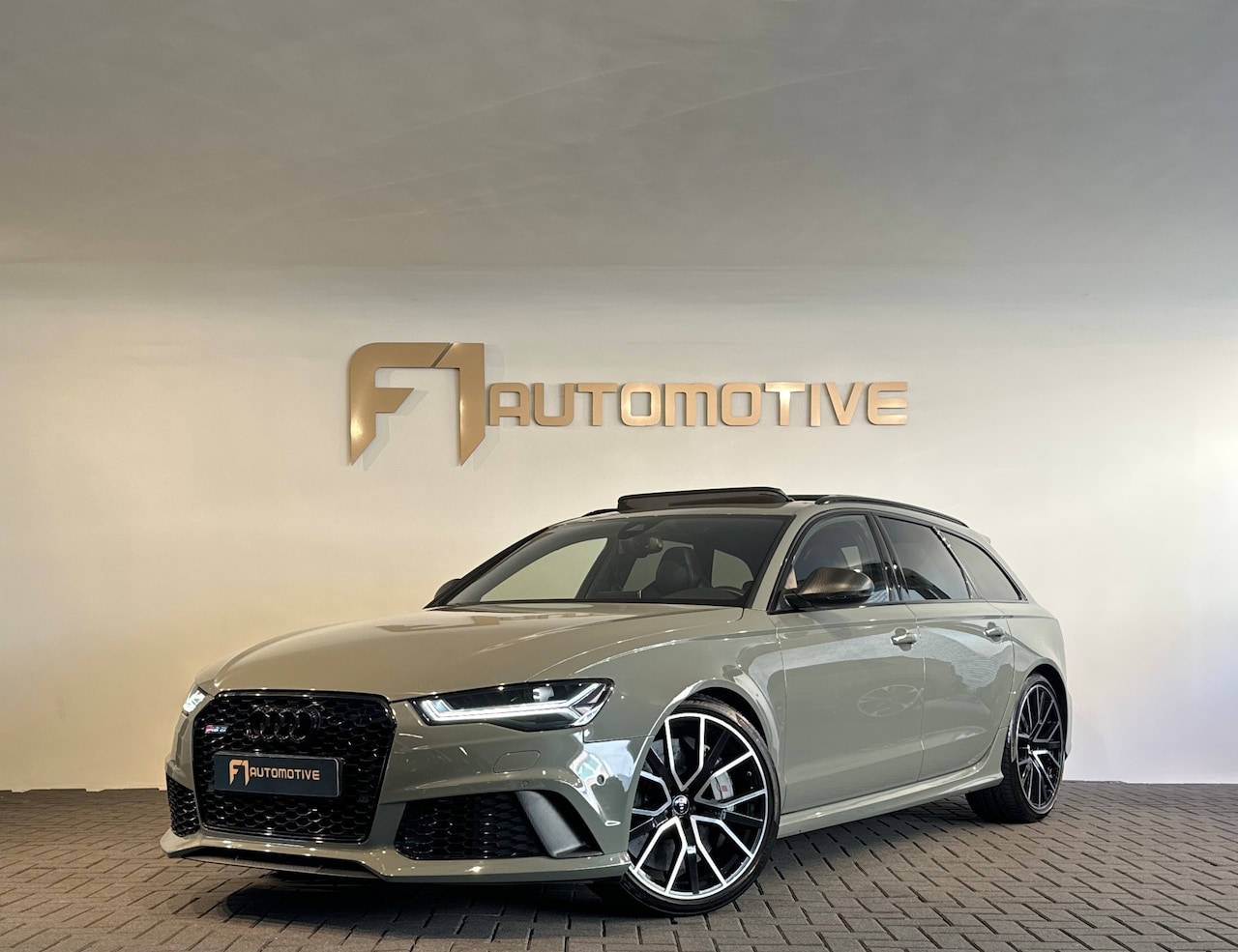 Audi A6 Avant - 4.0 TFSI RS 6 quattro performance Pano|Ceramic|Bose|Keyless|Camera|Stoelverwarming - AutoWereld.nl