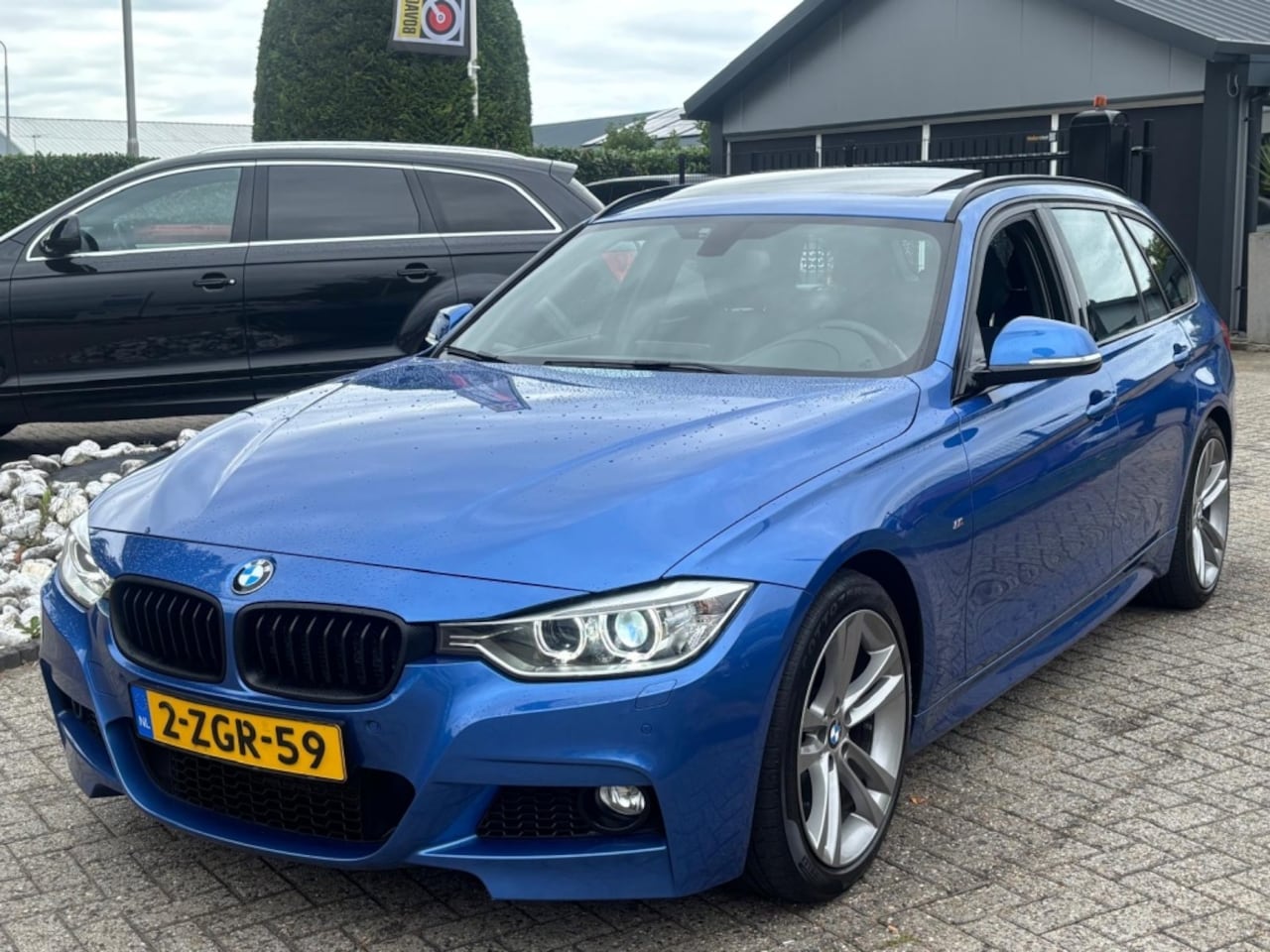 BMW 3-serie Touring - 320i Automaat 2015 Pano M-Pakket Trekhaak - AutoWereld.nl