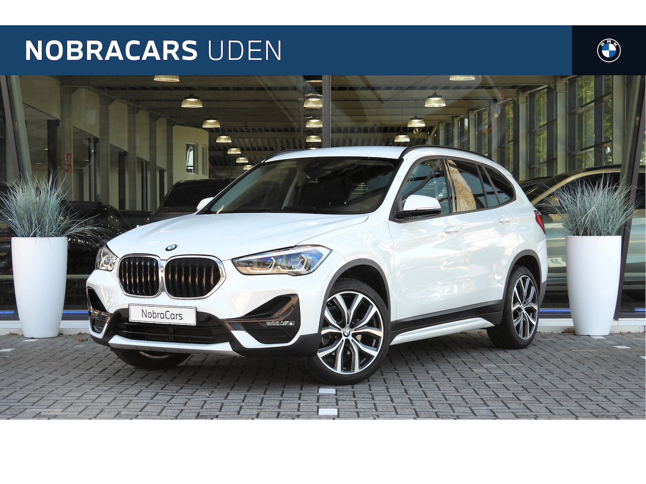 BMW X1 - sDrive18i Business Edition / HiFi / Sportstoelen / Head-Up / Getint glas / Stoelverwarming - AutoWereld.nl