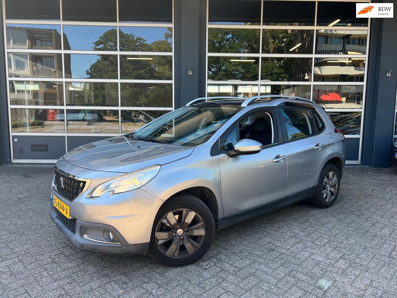 Peugeot 2008 - 1.2 PureTech Blue Lion | Distributie reeds vervangen | Olie probleem - AutoWereld.nl