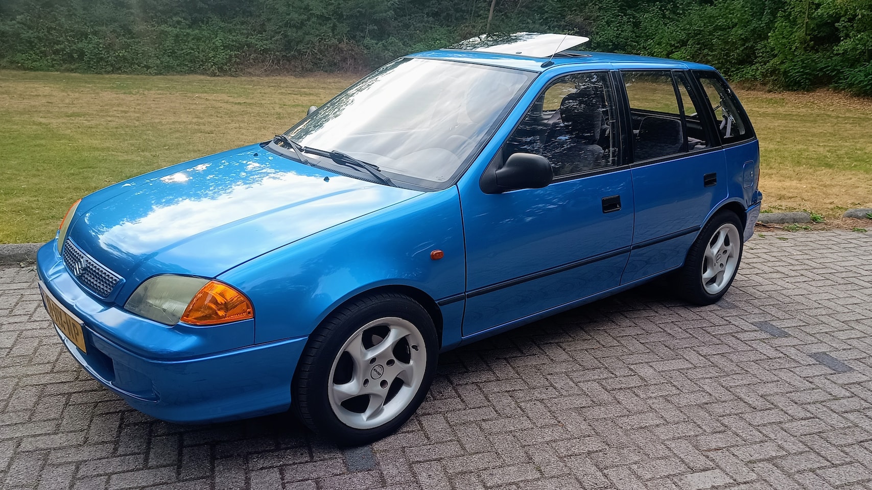 Suzuki Swift - 1.3-16V Summum - AutoWereld.nl
