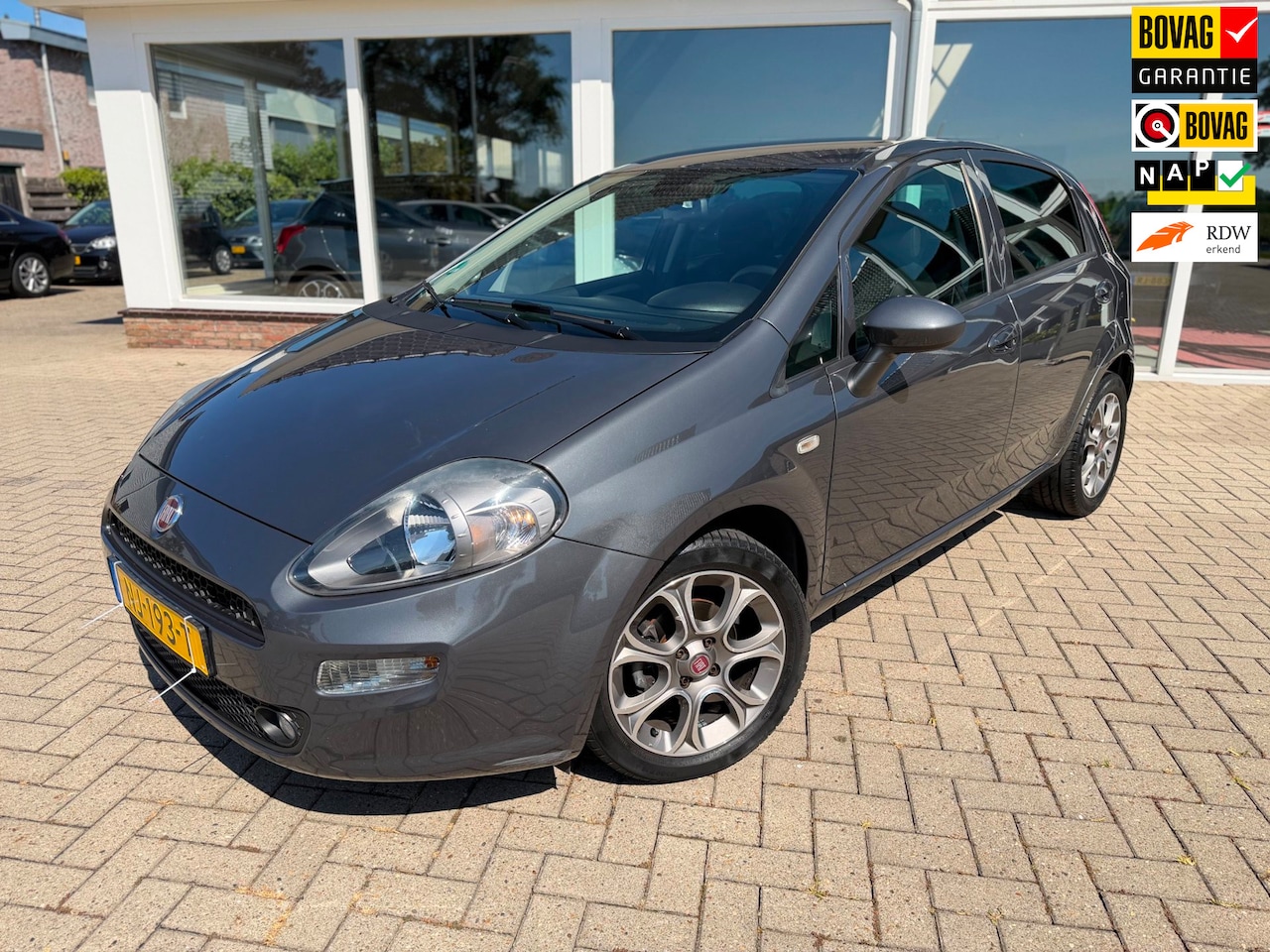 Fiat Punto Evo - 0.9 TwinAir Lounge/ Airco/ Navi/ Cruise/ LM Velgen/ Alcantara - AutoWereld.nl