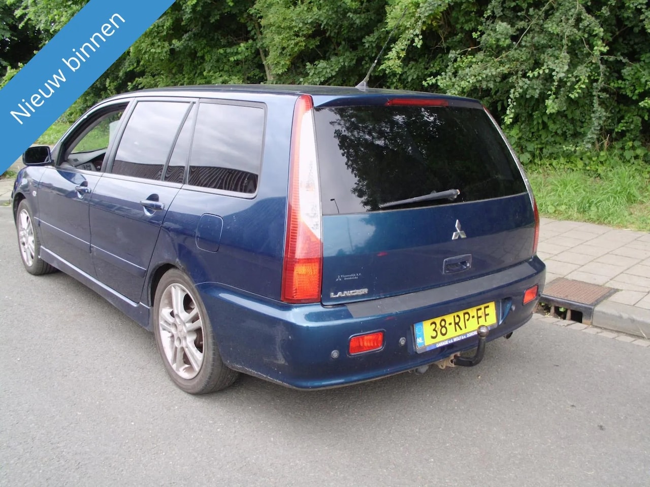 Mitsubishi Lancer Station Wagon - MITSUBISHI 2.0 MET AIRCO 2005 met trekhaak airco - AutoWereld.nl