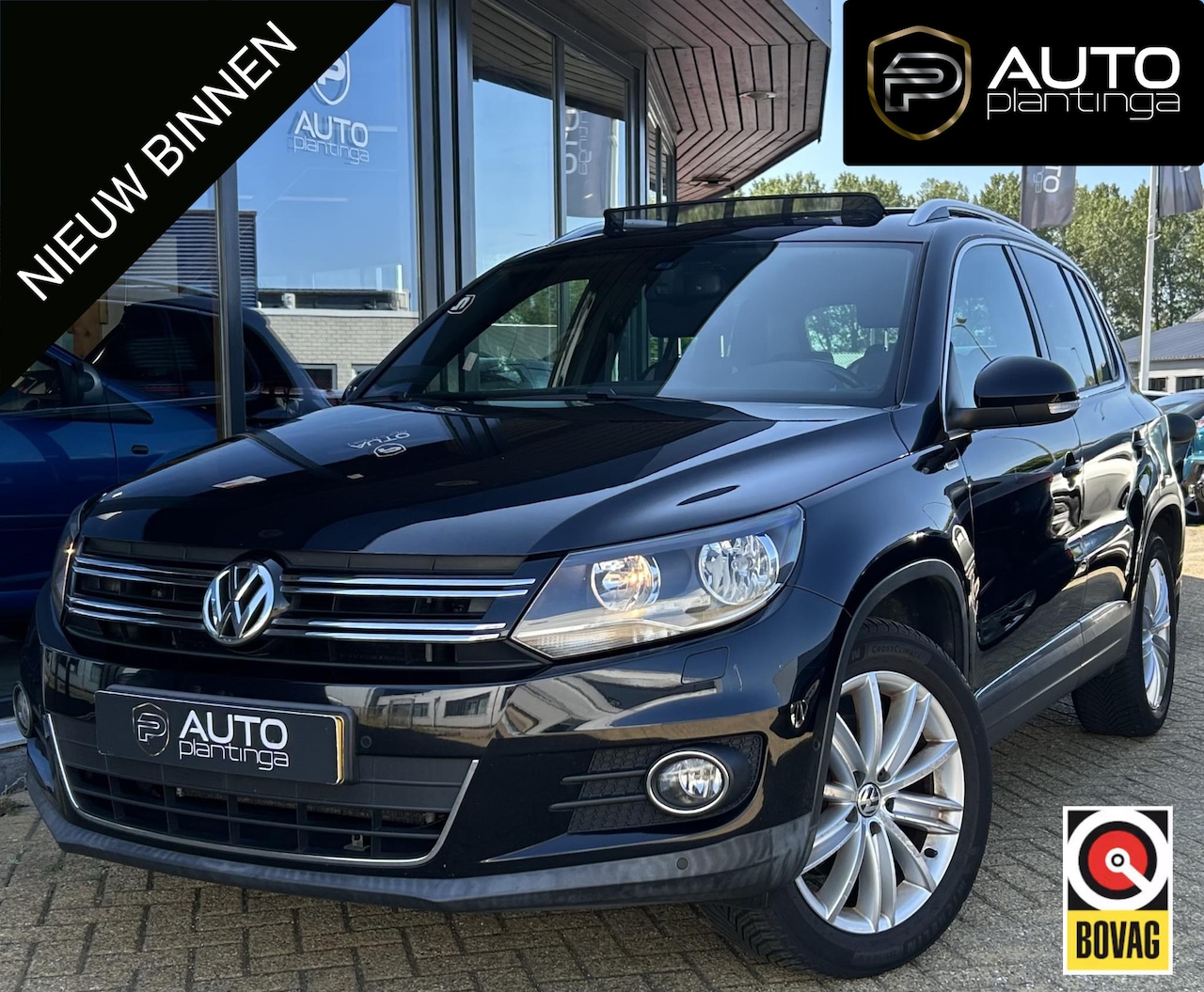 Volkswagen Tiguan - 2.0 TSI Sport&Style 4motion R-line Edition 179PK | Nette Staat! | AUTOMAAT | PANO | Trekha - AutoWereld.nl