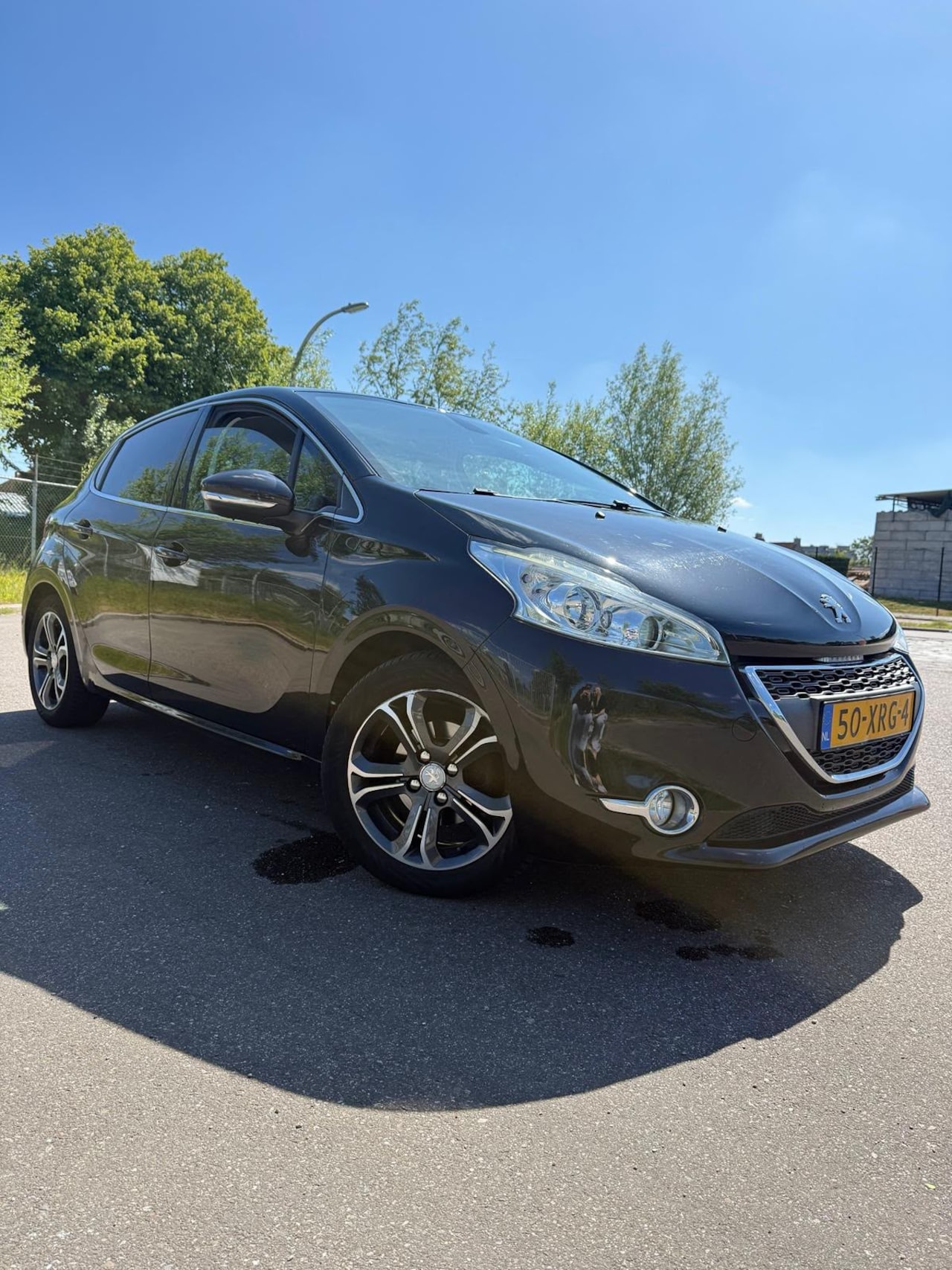 Peugeot 208 - 1.4 Vti Griffe leather interior - AutoWereld.nl