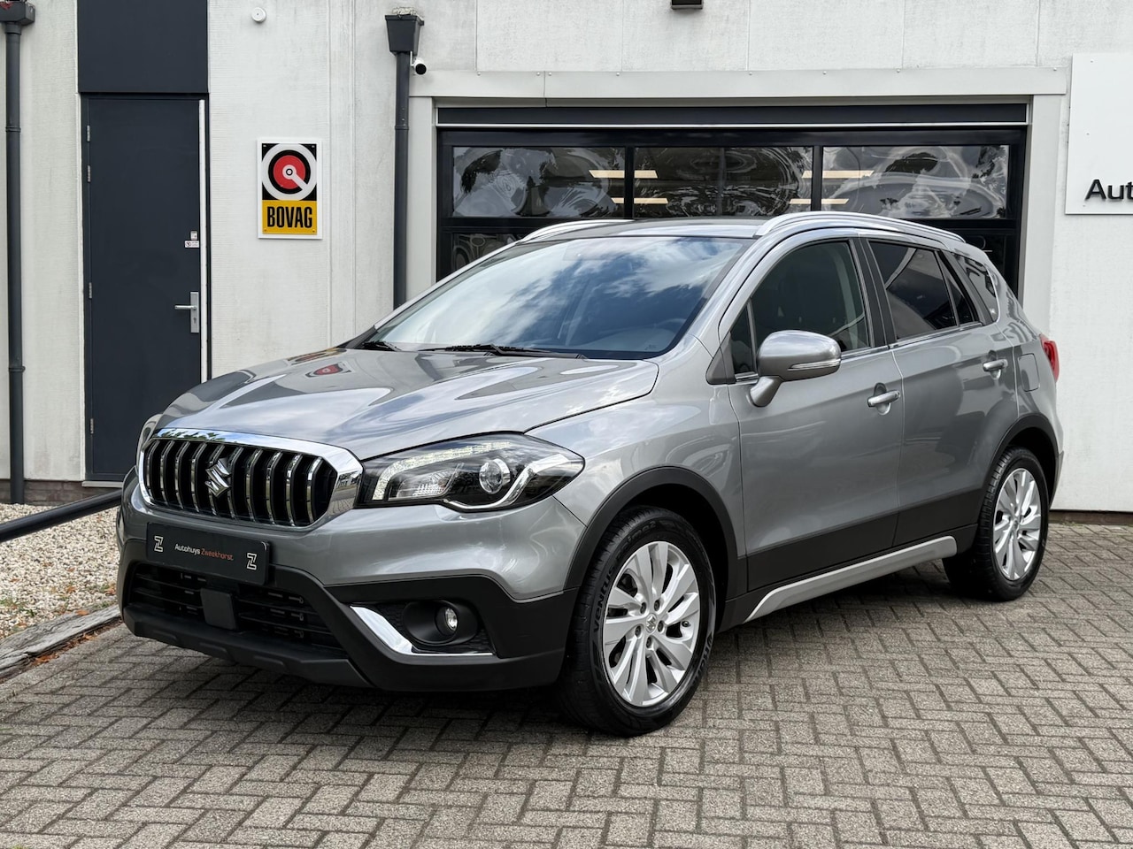 Suzuki S-Cross - 1.0 Boosterjet Comfort Navigatie | Camera | Stoelverwarming | Cruise Control | Slechts 79. - AutoWereld.nl