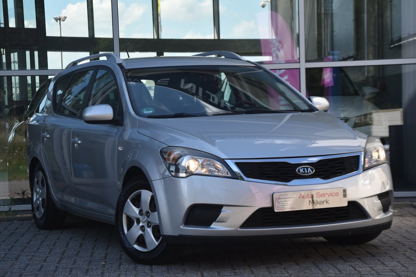 Kia Cee'd Sporty Wagon - 1.4 CVVT | Airco | Trekhaak | Cruise | Bluetooth | NAP | APK - AutoWereld.nl