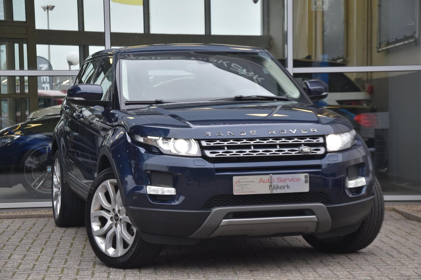 Land Rover Range Rover Evoque - 2.0 Si 4WD Automaat | Leder | Camera | Navi | 241 PK - AutoWereld.nl