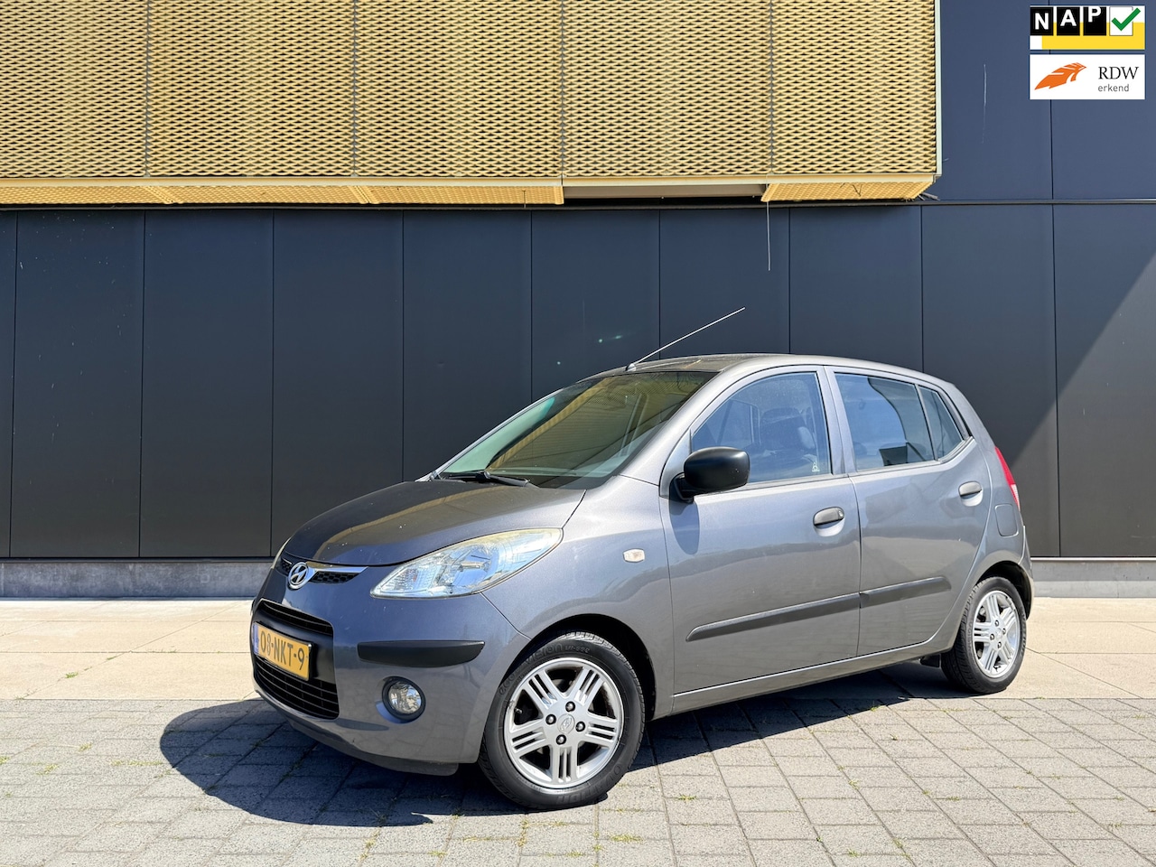 Hyundai i10 - 1.1 Active Orange Babies | Airco | Parksens | LM velgen | 5-deurs | NAP - AutoWereld.nl