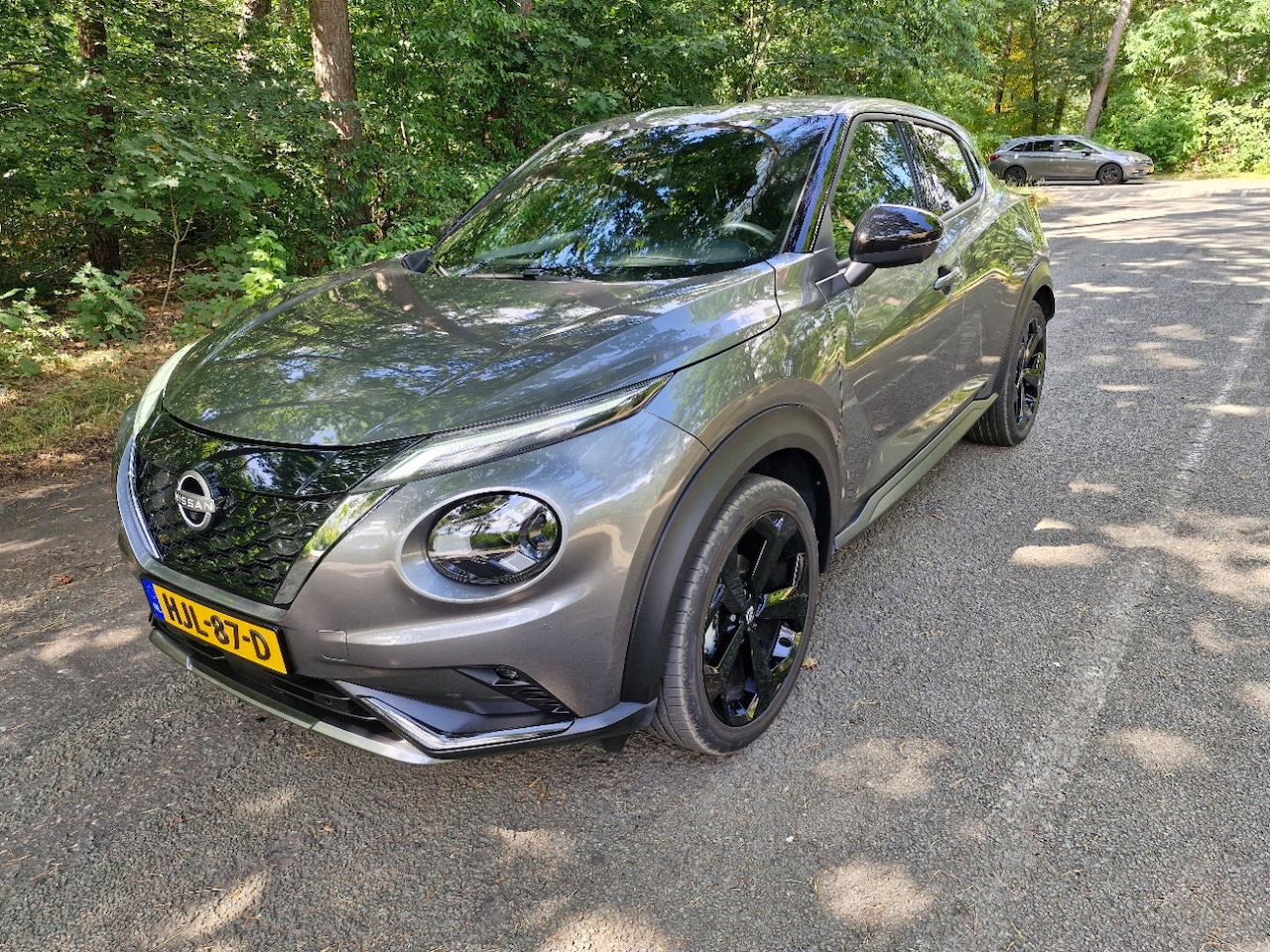 Nissan Juke - 1.6 Hybrid Tekna BOSE .Automaat.leer - AutoWereld.nl