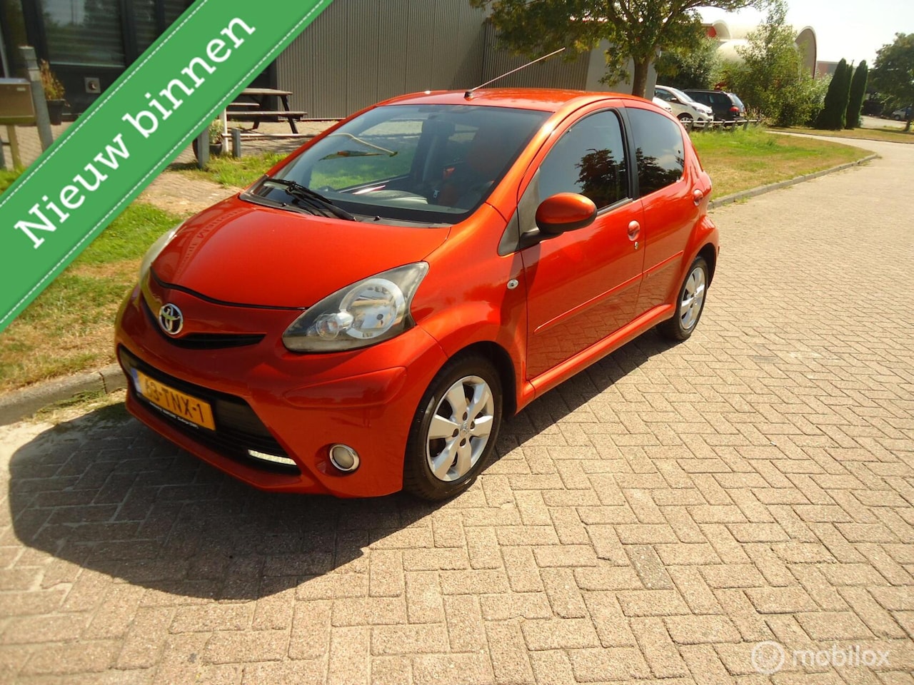 Toyota Aygo - 1.0 VVT-i Dynamic Orange 1.0 VVT-i Dynamic Orange - AutoWereld.nl