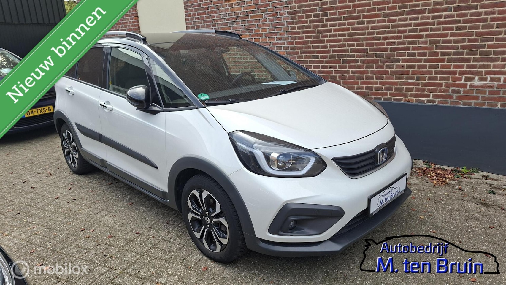 Honda Jazz - 1.5 e:HEV Crosstar Two-tone (zwart dak) - AutoWereld.nl