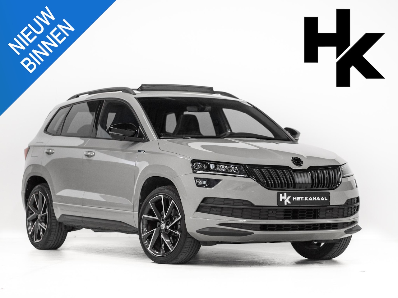 Skoda Karoq - 2.0 TSI 4x4 Sportline Business Pano ACC Keyless Stoelv - AutoWereld.nl