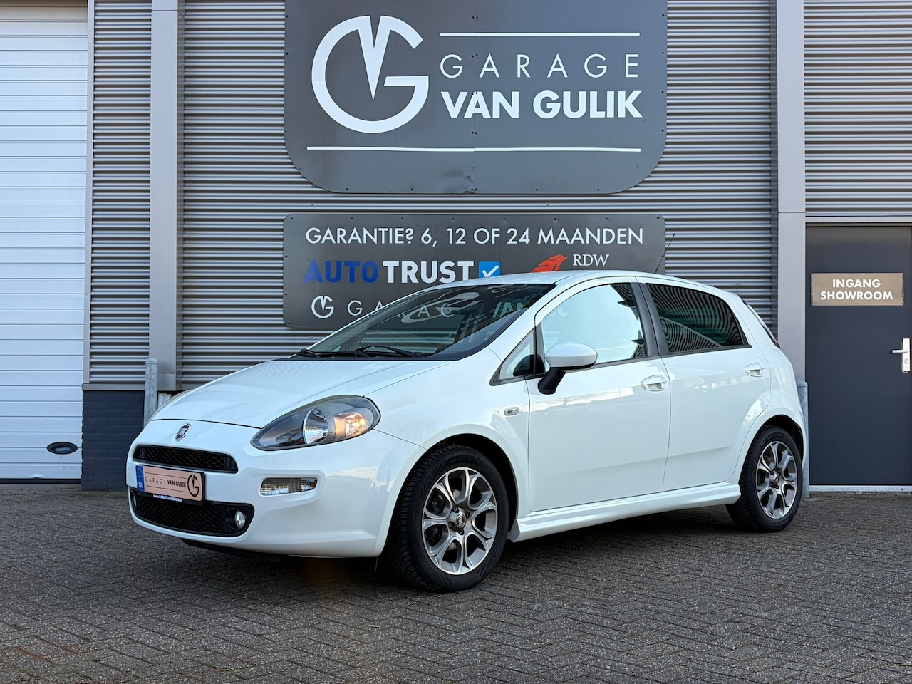 Fiat Punto Evo - 0.9 TwinAir Lounge 86PK Clima,Cruise,Bletooth,ElektrRamen+Spiegels,Parkeersensoren,City-St - AutoWereld.nl