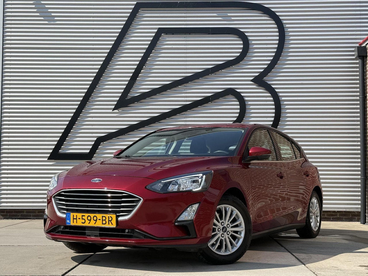 Ford Focus - 1.0 EcoBoost Titanium Business 2e Eigenaar|Navi|B&O|Adap Cruise|Stoel+Stuurverw|Clima|Carp - AutoWereld.nl