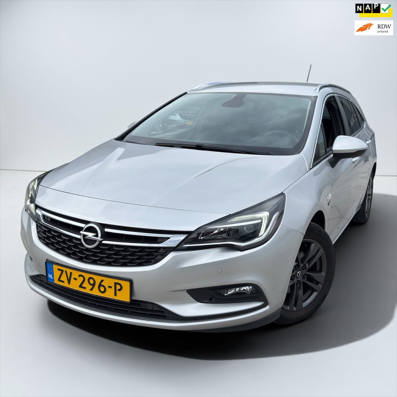Opel Astra Sports Tourer - 1.0 Turbo 120 Jaar Edition NAVI parkeersensor - AutoWereld.nl