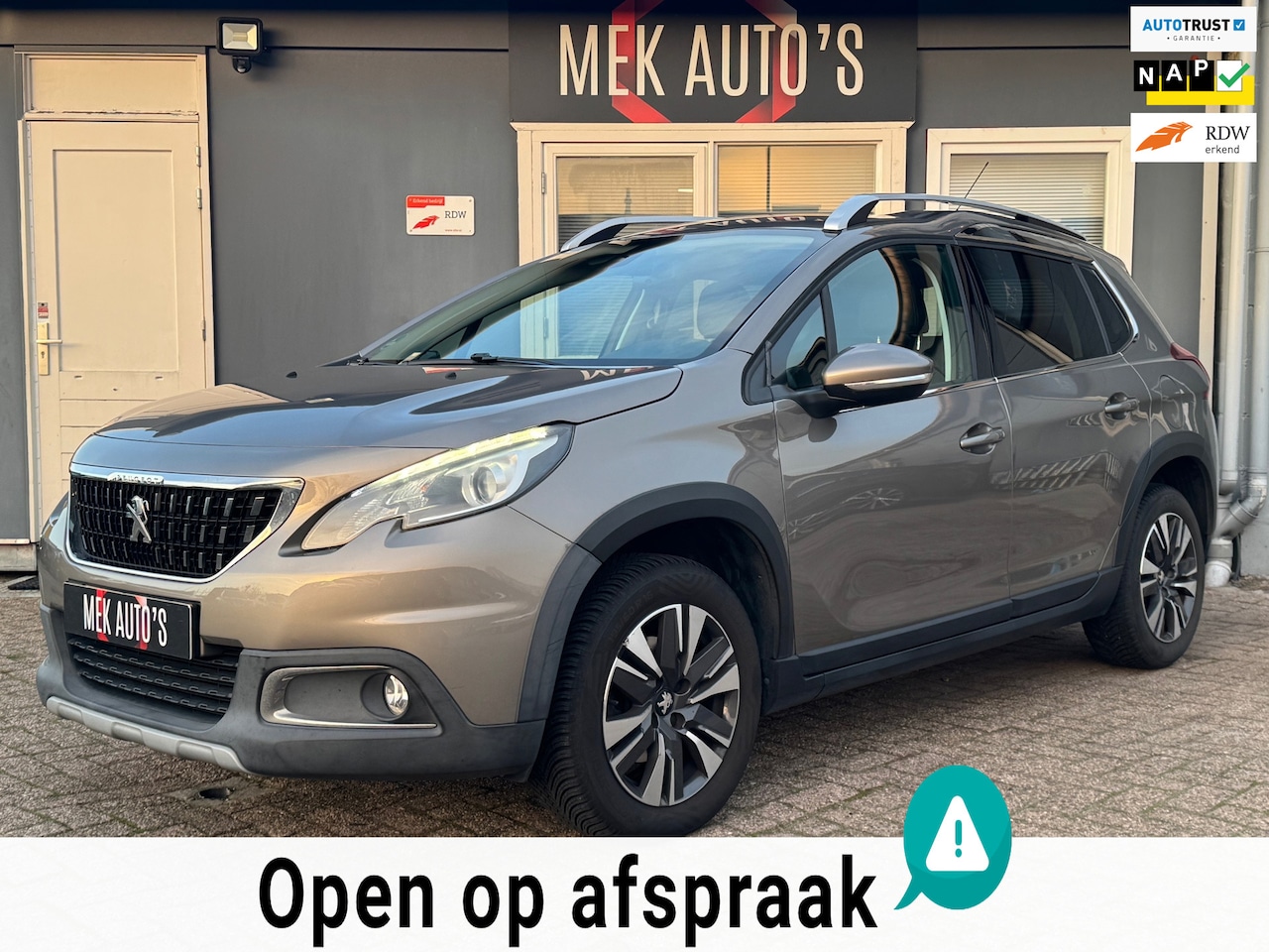 Peugeot 2008 - 1.2 PureTech Féline|Navi|Clima|Leder|Cruise|2e Eig|Dealer Onderhouden| - AutoWereld.nl