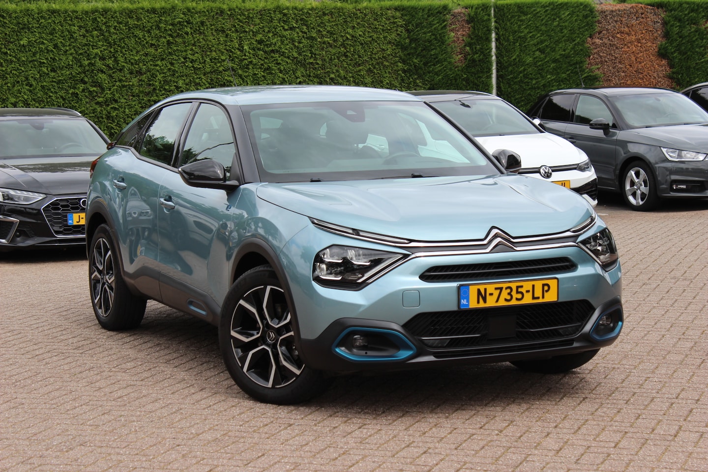 Citroën Ë-C4 - Feel 50 kWh / SoH 96,4%! / Camera / Head-up / Keyless / CarPlay / 18'' / Dodehoek / DAB / - AutoWereld.nl