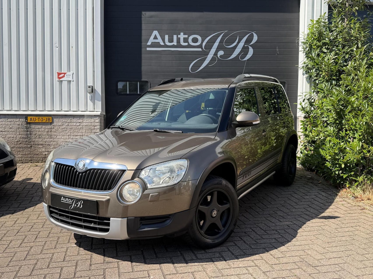 Skoda Yeti - 1.2 TSI ACTIVE | TREKHAAK | ALL-SEASON | APK 2027 - AutoWereld.nl
