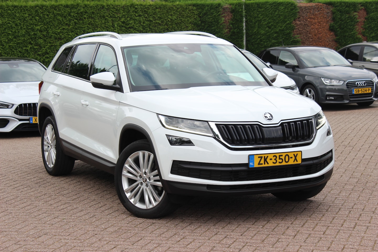 Skoda Kodiaq - 1.5 TSI Business Edition / Trekhaak / Camera / Leder&Alcantara / 19'' / Keyless / Premium - AutoWereld.nl