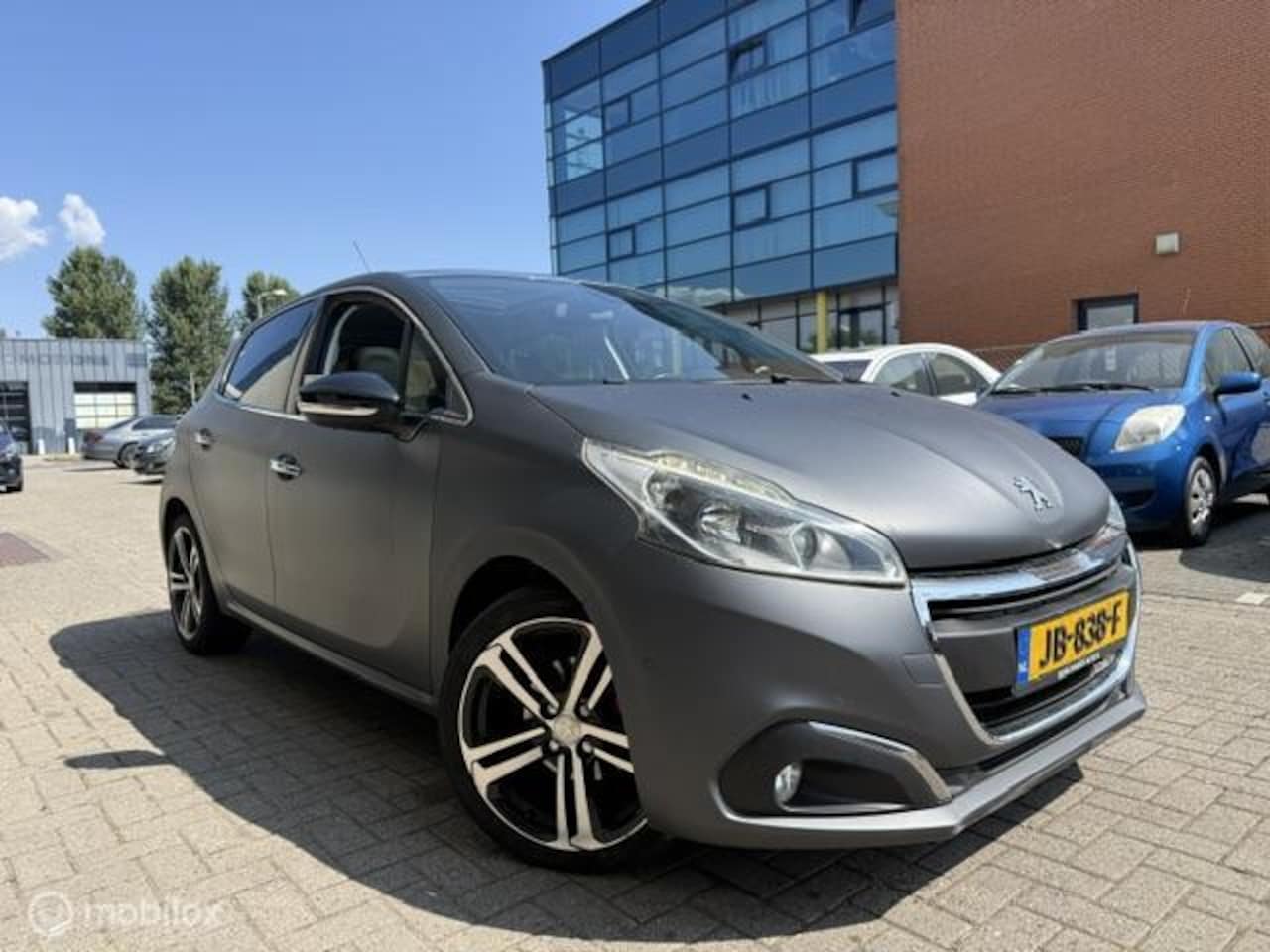 Peugeot 208 - 1.2 Benz GT Line Pano Camera - AutoWereld.nl