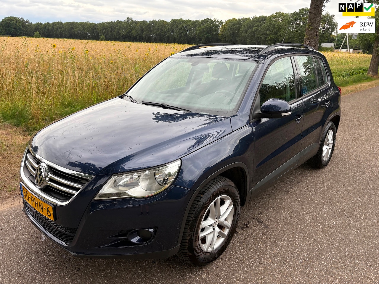 Volkswagen Tiguan - 1.4 TSI Comfort&Design APK/1ste eigenaar/Netjes/Rijdt perfect - AutoWereld.nl