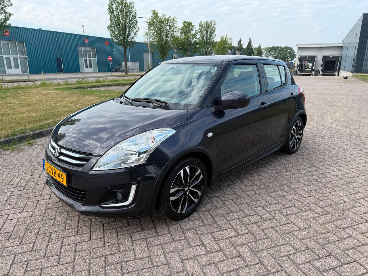 Suzuki Swift - 1.2 Style EASSS Leder alcantara LED - AutoWereld.nl