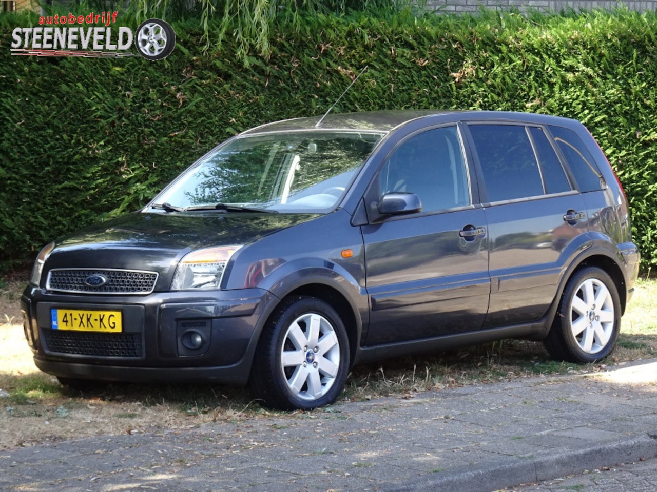 Ford Fusion - 1.4 16V Futura+ met Airco en Trekhaak - AutoWereld.nl