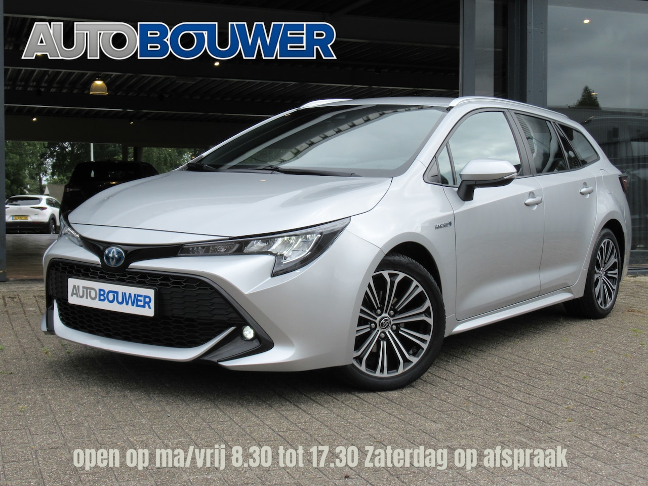 Toyota Corolla Touring Sports - 1.8 Hybrid First Edition 2e eigen | full option | tr.haak - AutoWereld.nl