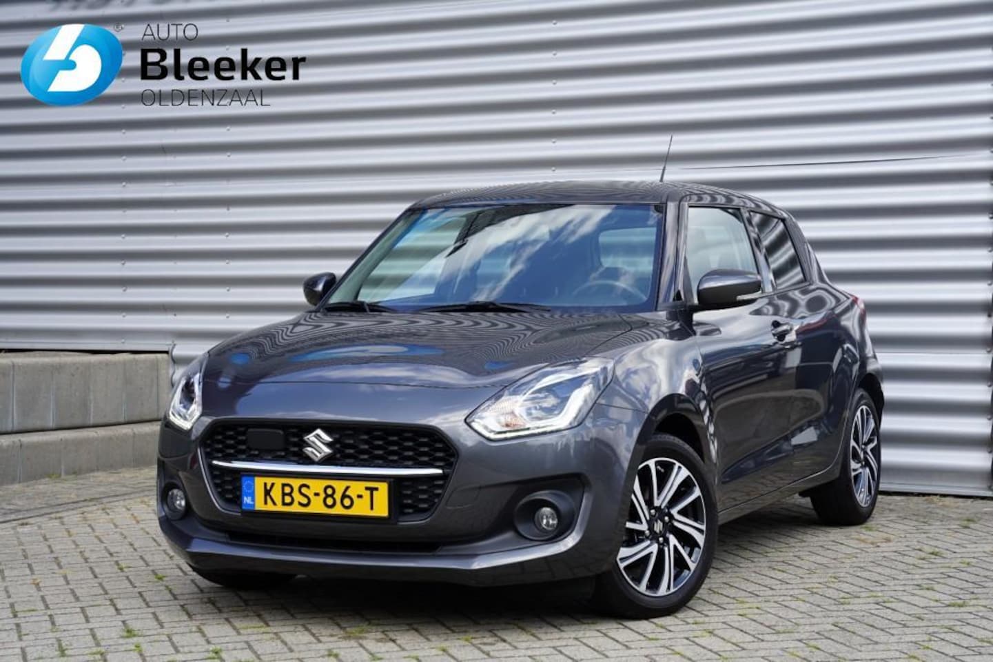 Suzuki Swift - 1.2 Style Smart Hybrid 82PK Ecc Navi Cruise Camera Stoel-verw. - AutoWereld.nl