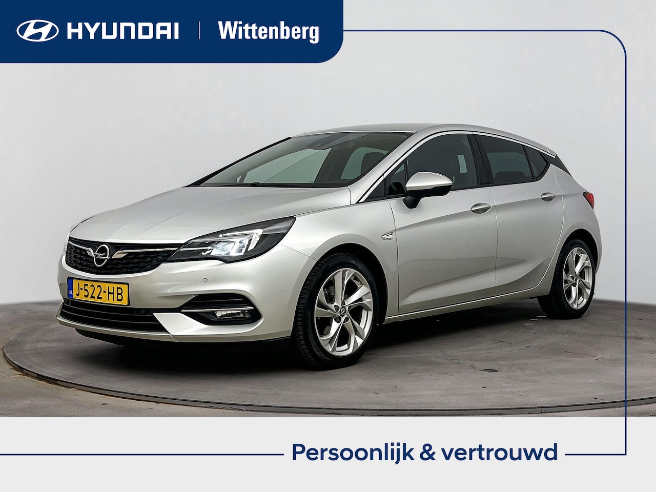 Opel Astra - 1.2 EDITION | AIRCO | CRUISE | CAMERA | NAVI | 16'' LM VELGEN | PRIVACY GLASS | APPLE CARP - AutoWereld.nl