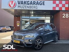 BMW X1 - xDrive20i Executive // PANO / SCHUIF- KANTELDAK // NAVI // PDC V+A // CRUISE // TREKHAAK /