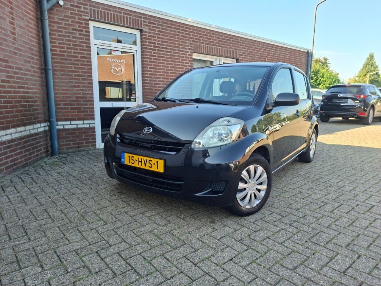 Daihatsu Sirion - 1.0-12V PREMIUM airco / elektrische ramen / aux - AutoWereld.nl