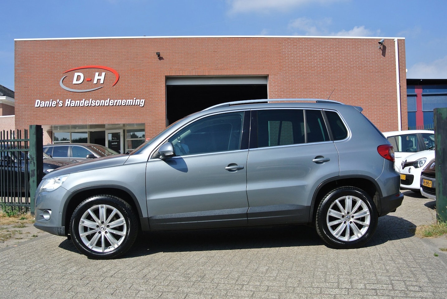 Volkswagen Tiguan - 1.4 TSI Sport&Style 4Motion airco inruil mogelijk - AutoWereld.nl