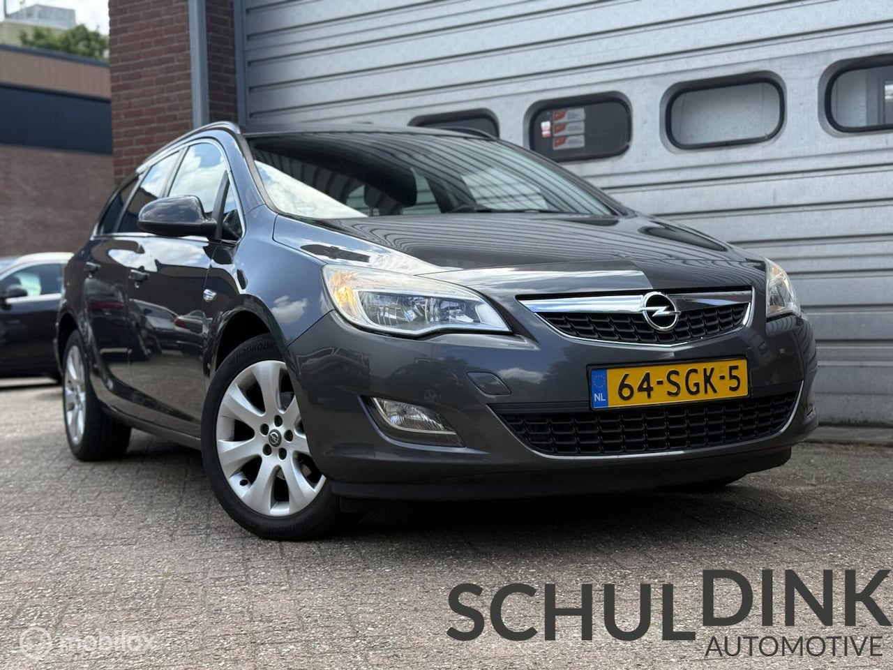 Opel Astra Sports Tourer - 1.4 Turbo Edition AIRCO|TREKHAAK - AutoWereld.nl
