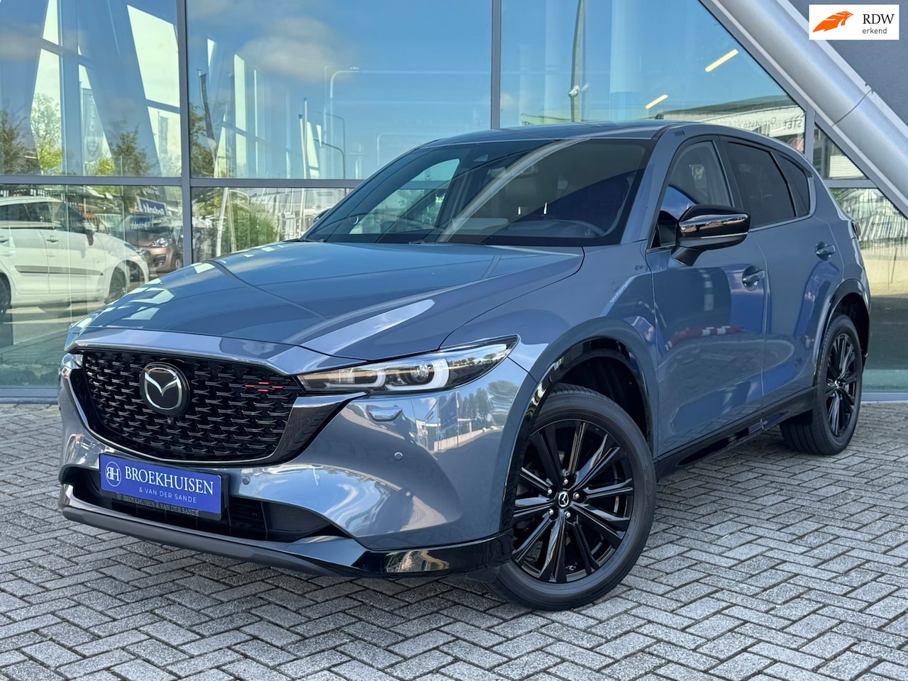 Mazda CX-5 - 2.0 e-SkyActiv-G M Hybrid 165pk Homura Automaat / Bose / Leder / HU Display - AutoWereld.nl