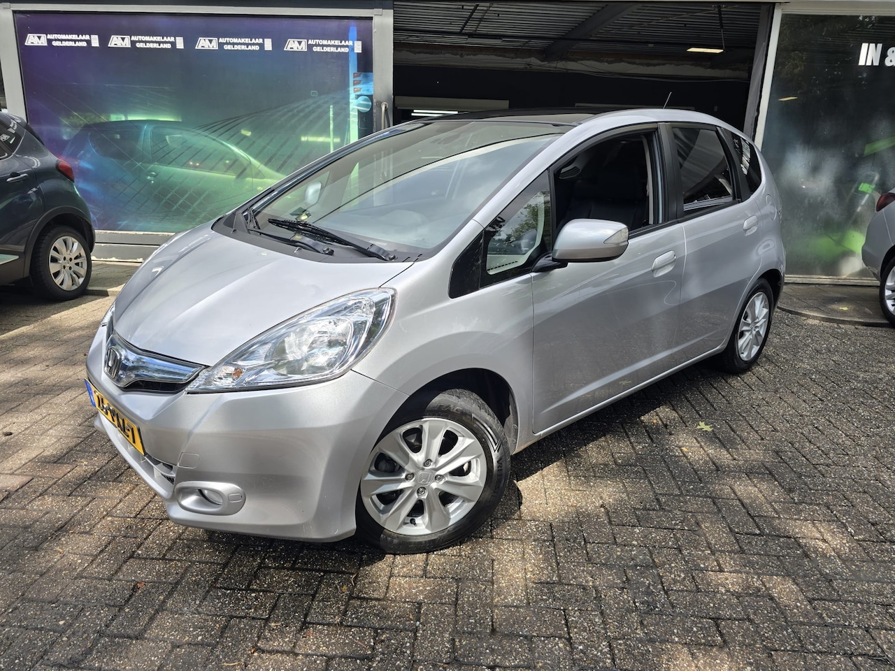 Honda Jazz - 1.4 Hybrid Exclusive | AUTOMAAT | 2E EIGENAAR | 3/6 OF 12MND GARANTIE | STOELVERWARMING | - AutoWereld.nl