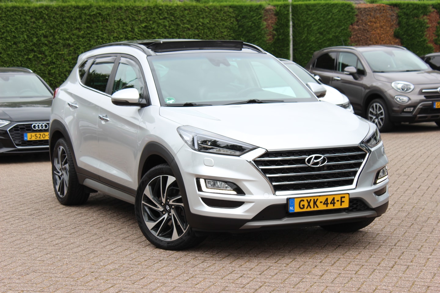 Hyundai Tucson - 1.6 T-GDI Premium / Full option! / Trekhaak / Panoramadak / 360Camera / Leder / Keyless / - AutoWereld.nl