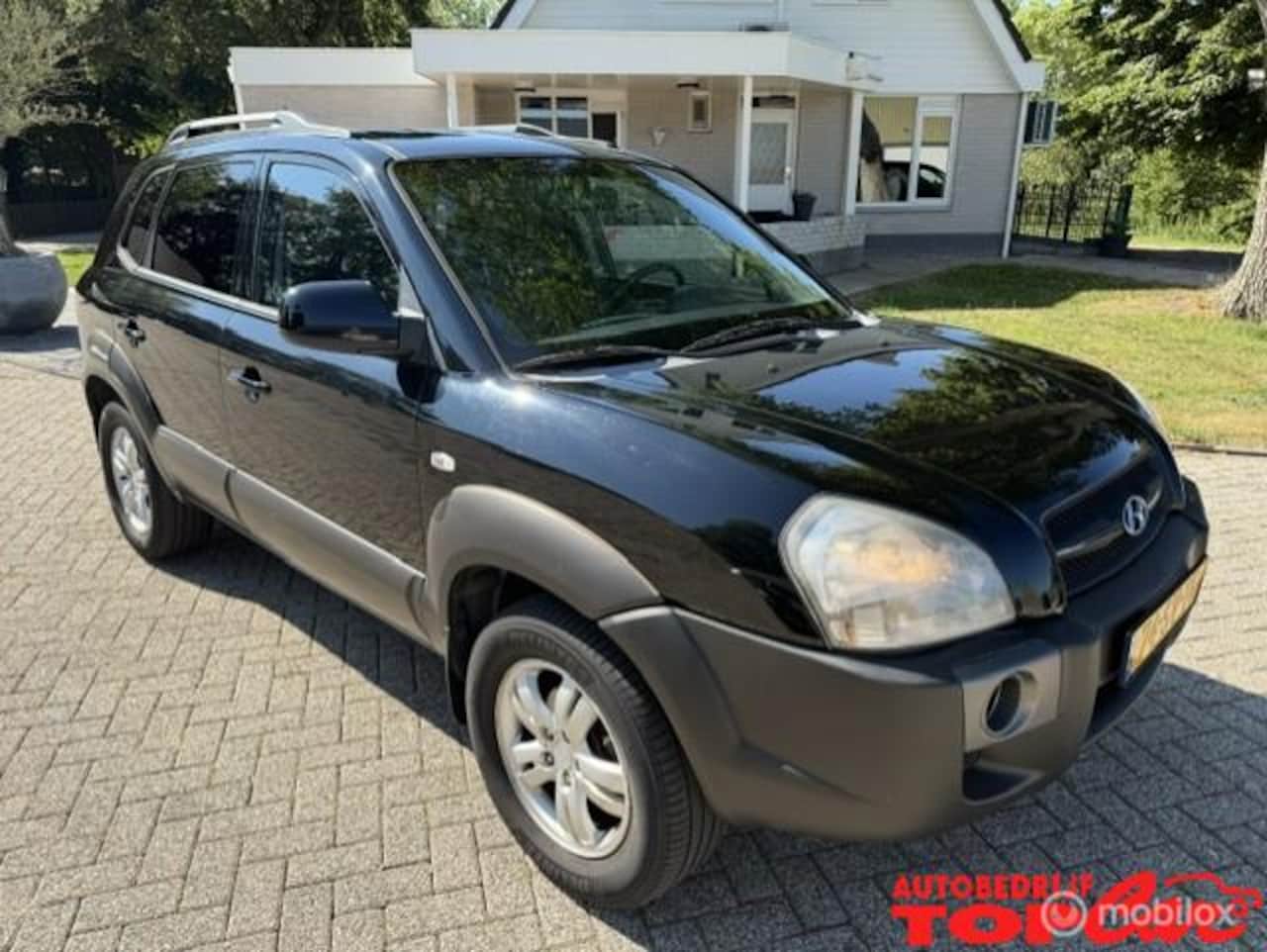 Hyundai Tucson - 2.0i Style 2.0i Style - AutoWereld.nl