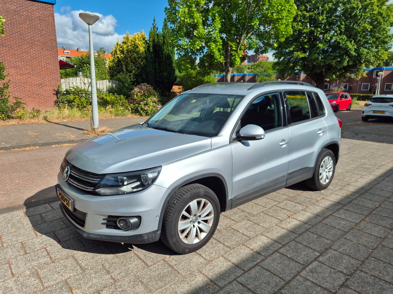 Volkswagen Tiguan - 1.4 TSI Track&Field 4Motion 4WD NW APK Parkassist - AutoWereld.nl