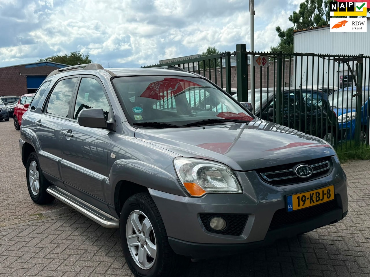Kia Sportage - 2.0 CVVT X-ecutive 1e eigenaar dealer onderhouden cruis control trekhaak airco - AutoWereld.nl