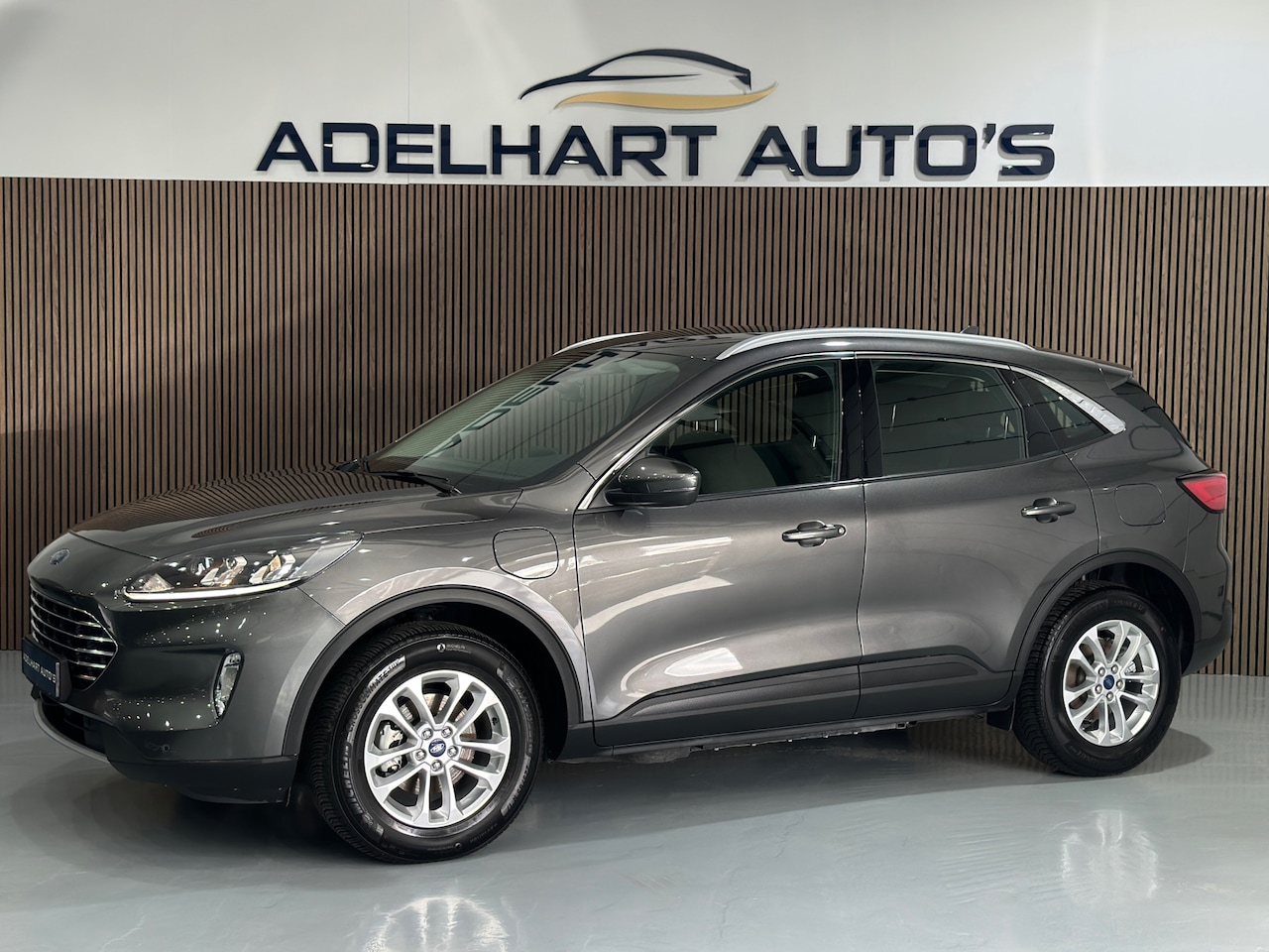 Ford Kuga - 2.5 PHEV Titanium Automaat / Navigatie full map / Camera / Cruise control / Climate contro - AutoWereld.nl