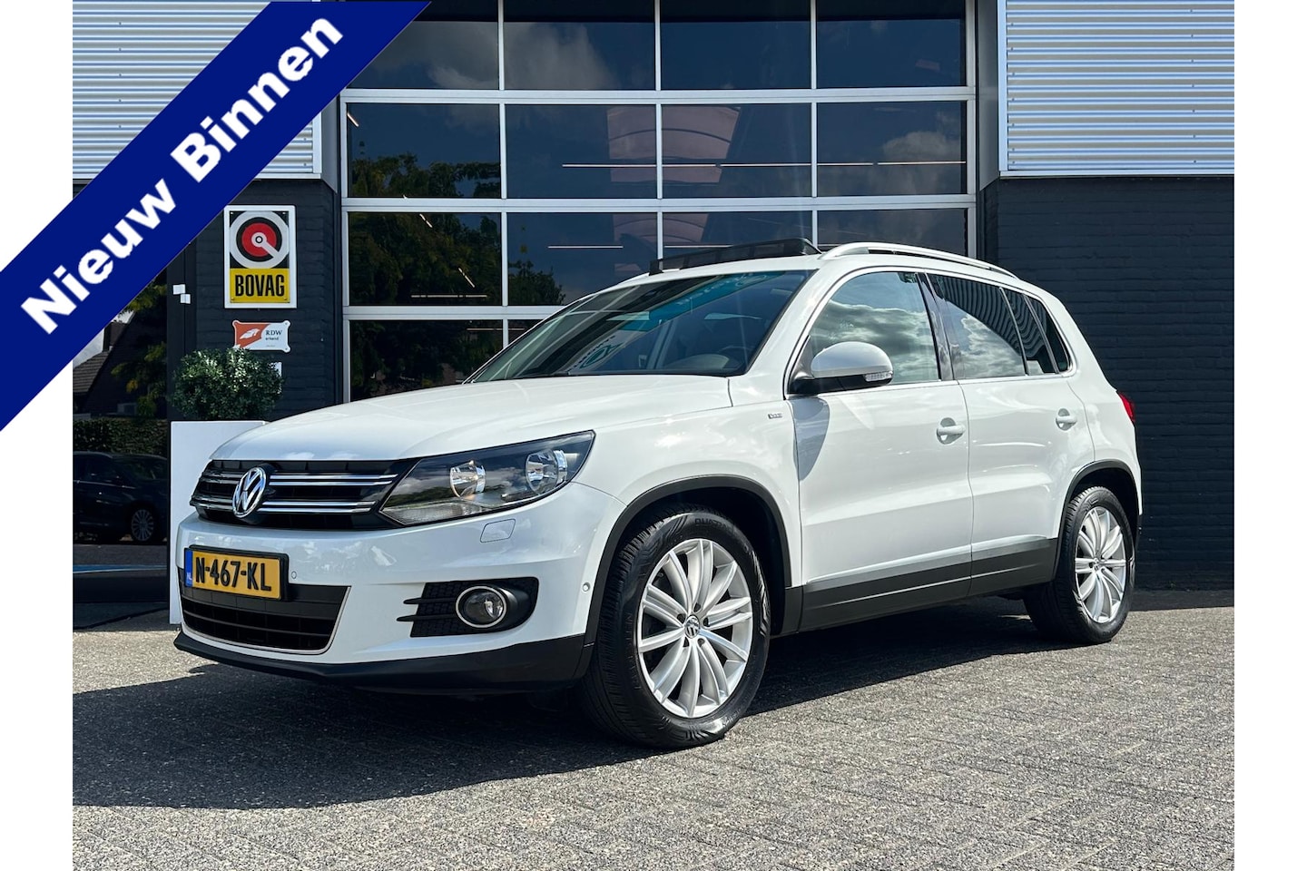 Volkswagen Tiguan - 1.4 TSI R-Line Edition 1.4 TSI R-Line Edition, Airco, Bluetooth, Panorama, Navi, PDC, NW Koppeling - AutoWereld.nl