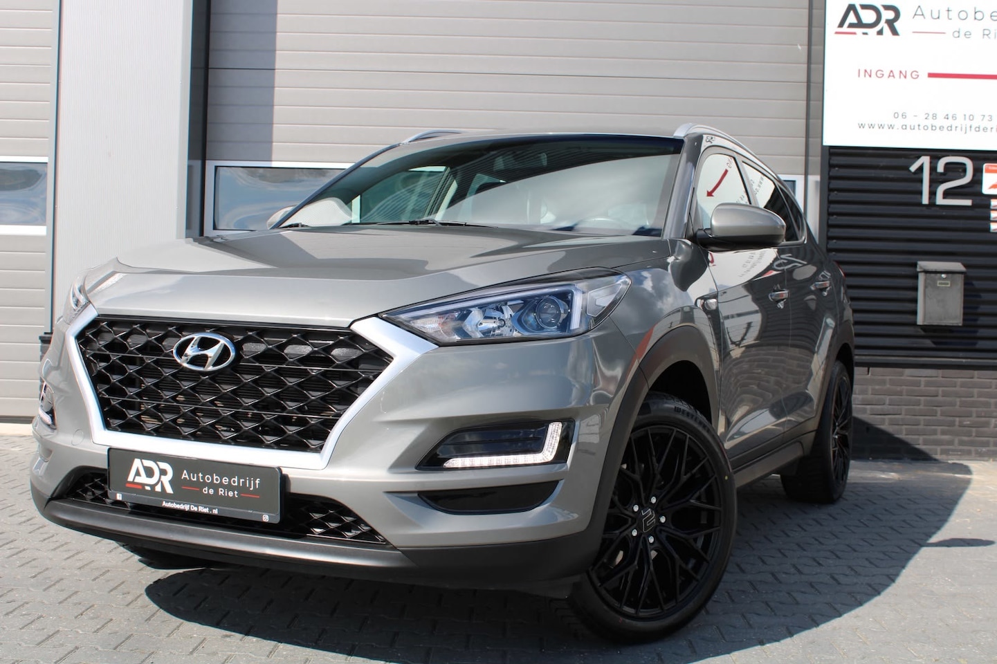 Hyundai Tucson - 1.6 GDI|19"LM VELGEN|CAMERA|AIRCO|CRUISE|STOELVER|VOLL - AutoWereld.nl