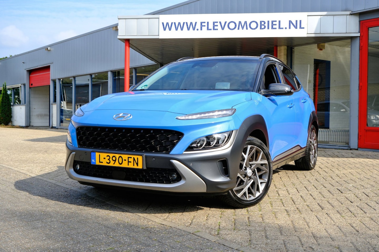 Hyundai Kona - 1.6 GDI HEV Premium Aut. Leder|1e Eig|Navi|Cam|CarPlay|HUD|LMV - AutoWereld.nl