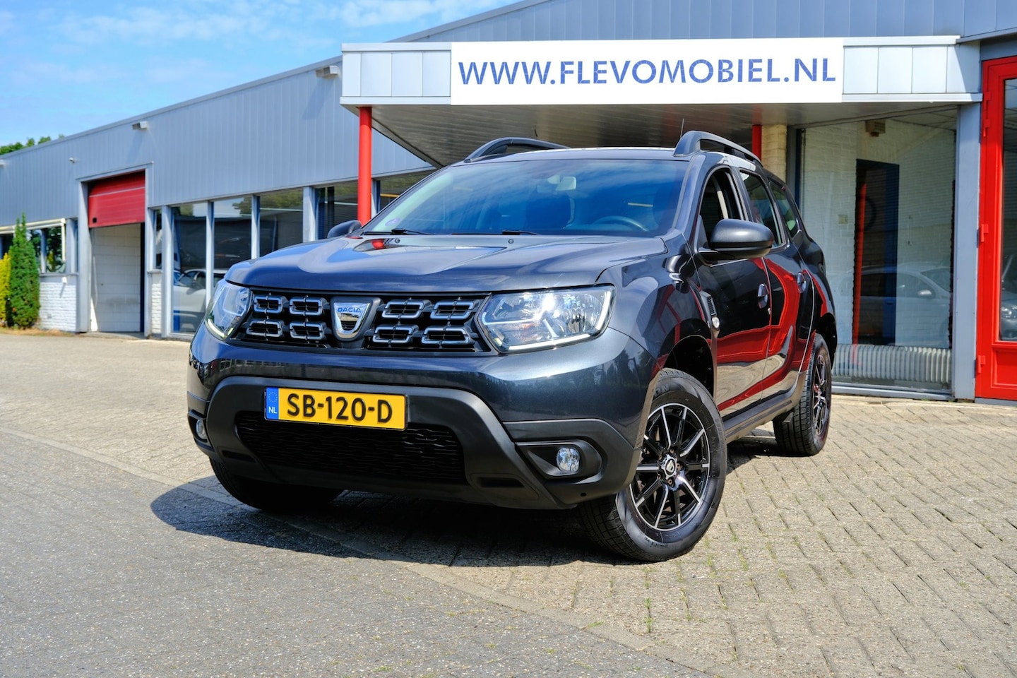 Dacia Duster - 1.2 125pk TCe Comfort Airco|Cruise|LMV - AutoWereld.nl